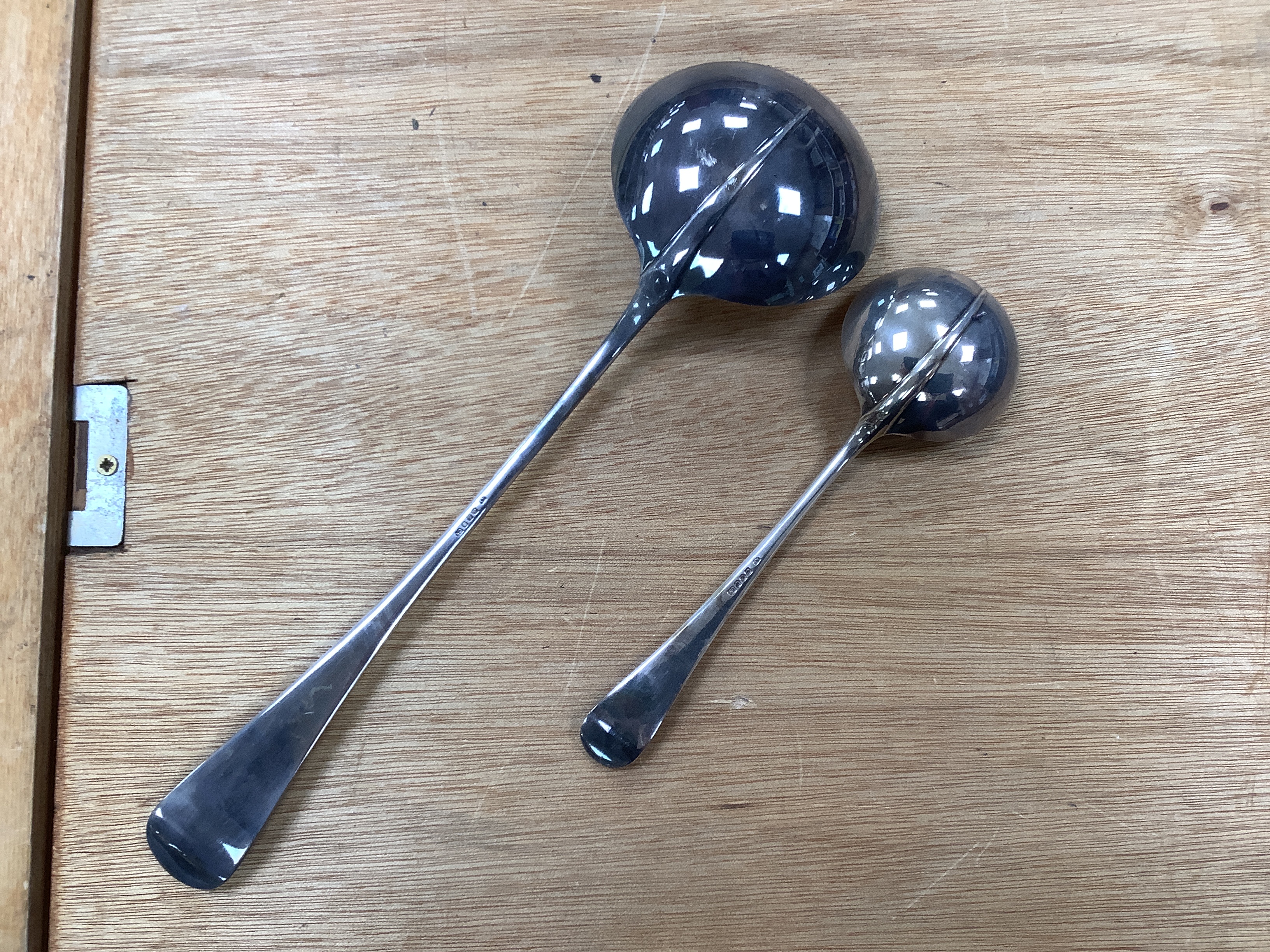 An oak canteen of plated suite of cutlery